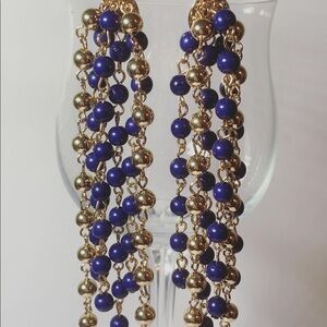 Gold and blue dangling earrings